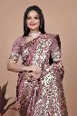 Color: Royal Purple with Multicolor Pallu  Fabric: Premium Banarasi Silk  Design: All-over golden motifs with zari woven border  Pallu: Artistic peacock-themed design in vibrant hues  Occasion: Festive, Wedding, Traditional Events  Saree Length: 5.5 meters | Blouse Piece: 08 meters (matching with border)