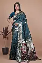 Color: Deep Teal with Multicolor Artistic Pallu  Fabric: Premium Banarasi Silk  Design: Gold zari motifs and intricately woven border  Pallu: Richly detailed peacock-themed scenic artwork  Occasion: Wedding, Festive, Party Wear  Saree Length: 5.5 meters | Blouse Piece: 0.8 m Unstitched