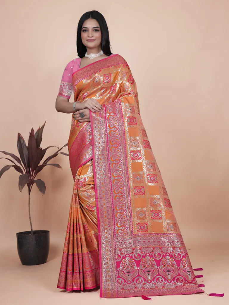 Color: Bright Orange with Pink border and pallu  Fabric: Luxurious Banarasi Silk Saree Length: 5.5 meters | Blouse Piece:0.80 meter