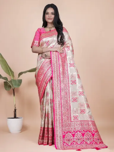Color: Cream body with Pink border and pallu  Fabric: Premium Banarasi Silk Saree Length: 5.5 meters Blouse Piece: 0.80 meter